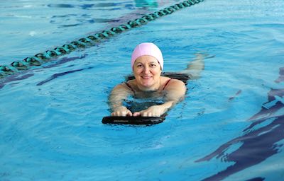 Lady learning to swim 
